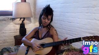 Hot Paul showing her medium tits and pussy with guitar