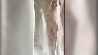 iPhone catches horny tattooed step-mom masturbating in the shower in hot portrait video