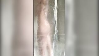 iPhone catches horny tattooed step-mom masturbating in the shower in hot portrait video