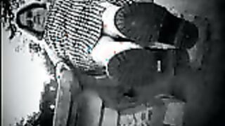 Nurse vicki models in her black and whot hogwarts outfit and spiked boots