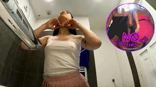 Braless hot brunette skinny and horny babe in a pink mini skirt to show her beautiful ass and legs