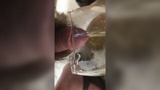 Pissing in the glass squatting